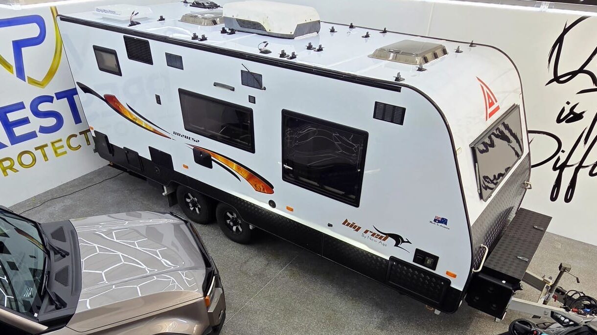 White caravan with Prestige Protection branding parked at the Gold Coast workshop